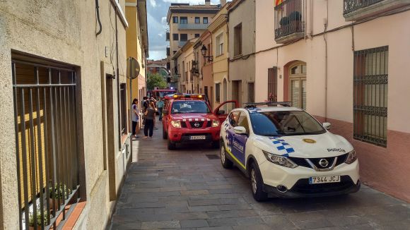 Crema la campana extractora d'un immoble al carrer del Carme