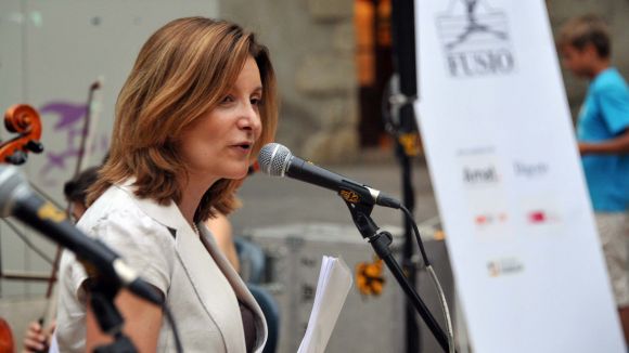 Premi a Gemma Navarra per la seva tasca a l'escola Fusió