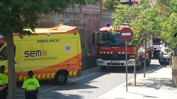 Foc en una cuina d'una casa del carrer d'Arbúcies