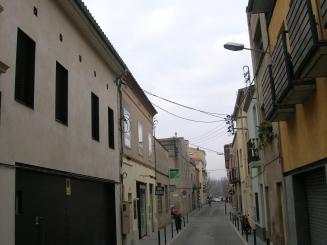 Retiren una pancarta contra la política urbanística de Recoder durant el pregó